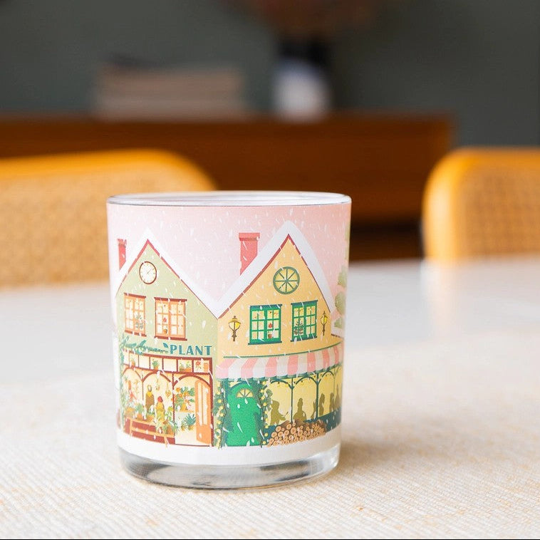 Lysholder i glass med juleillustrasjon